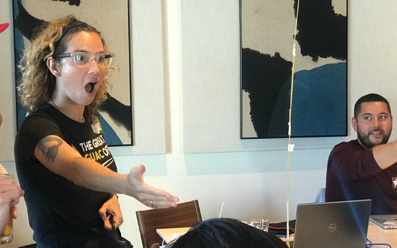 Guac Off team member faciltiating a team building activity.